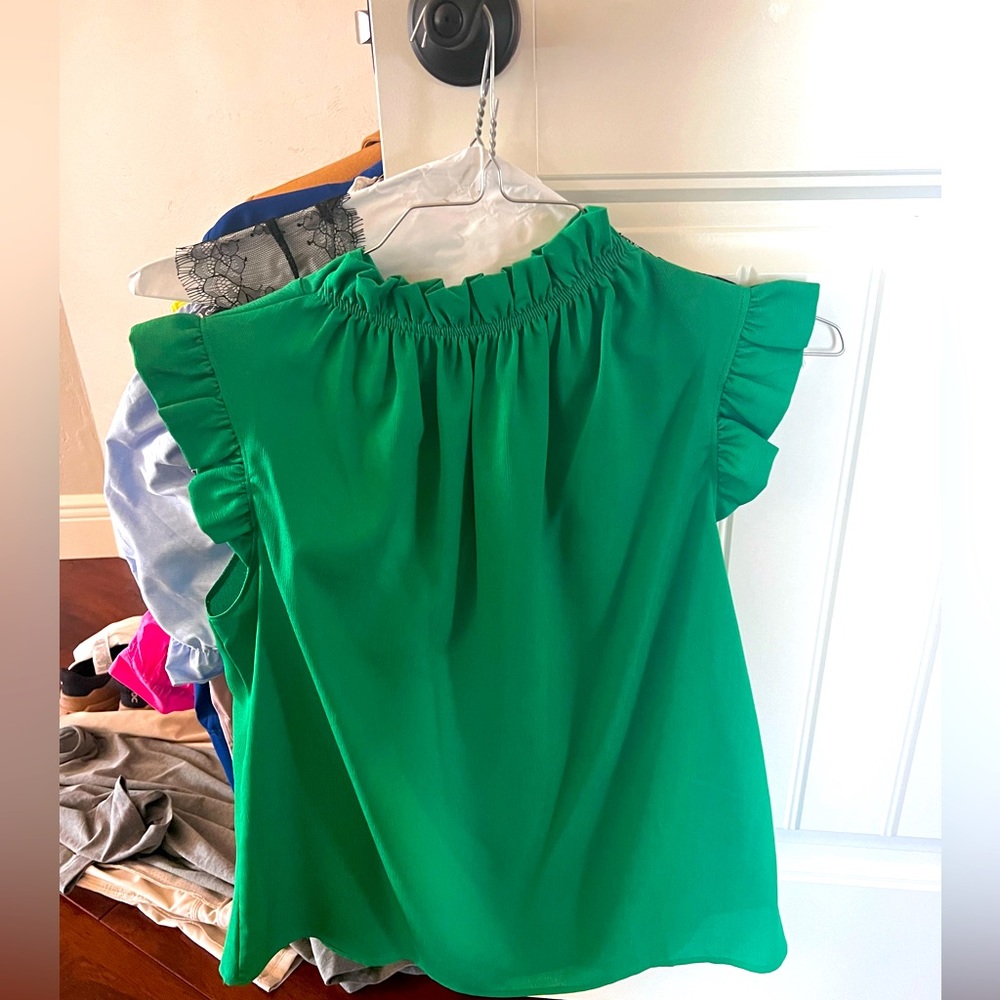 SOLD-Kelly green top with ruffles neck and shoulders